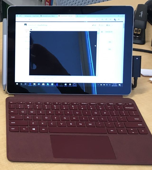 Surface Go with burgandy type cover
